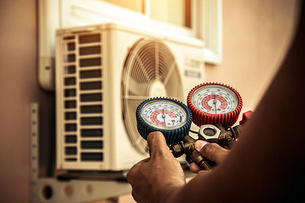 Professional Hvac technician working in Attleboro Falls, MA